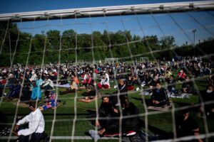 Muslims attend the morning prayer session to celebrate Eid at Lokomotiv Stadium in Sofia, the capital of Bulgaria.