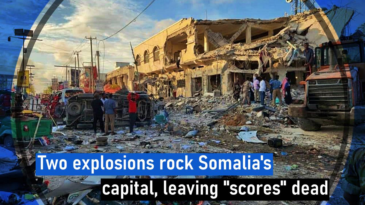 Two explosions rock Somalia’s capital, leaving scores dead